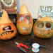 Three monster gourds sit with their gourd top waiting for their hats to be made